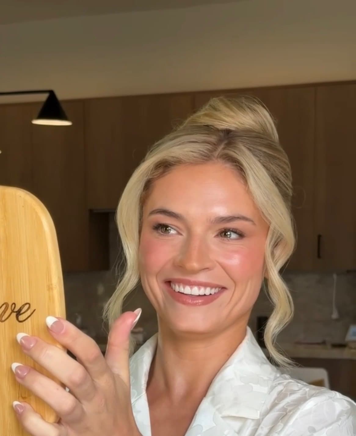 Blonde updo with glowing skin — special occasion look
